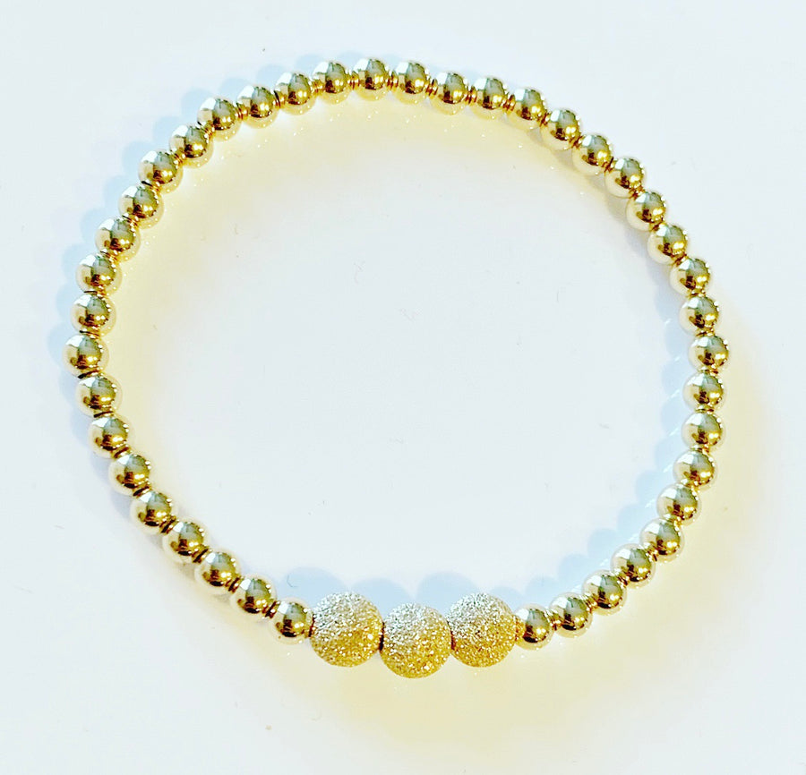 Gold Bracelet with Stardust Bead Details