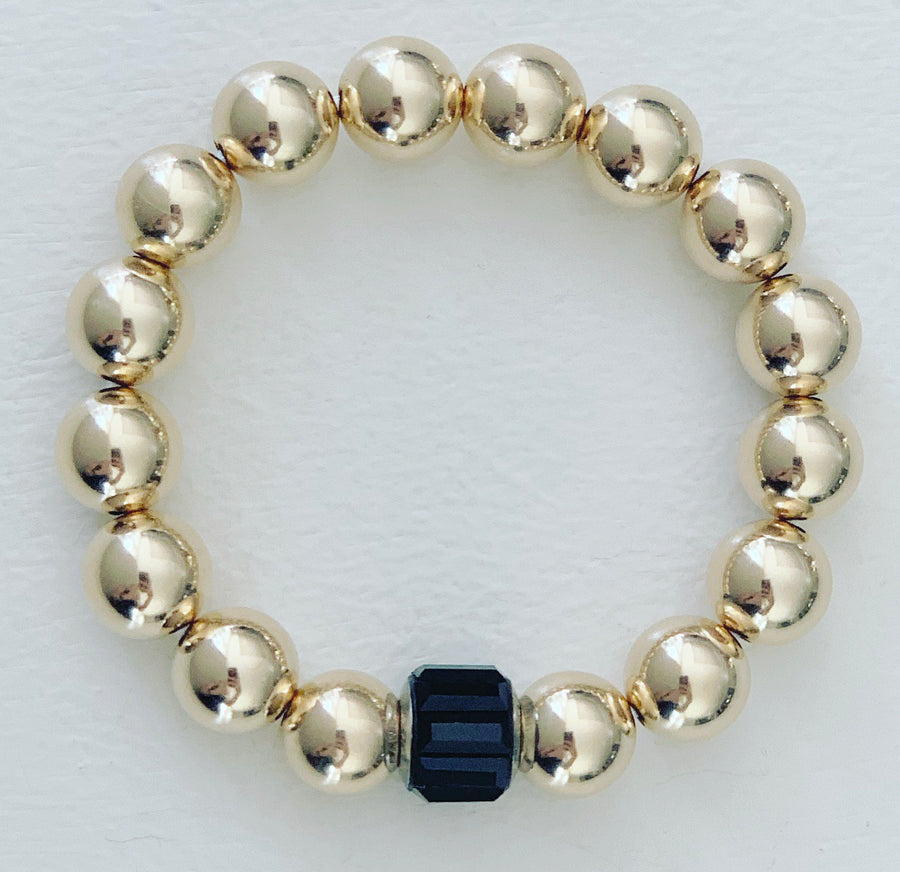 Jumbo 14K gold beads with black rondelle